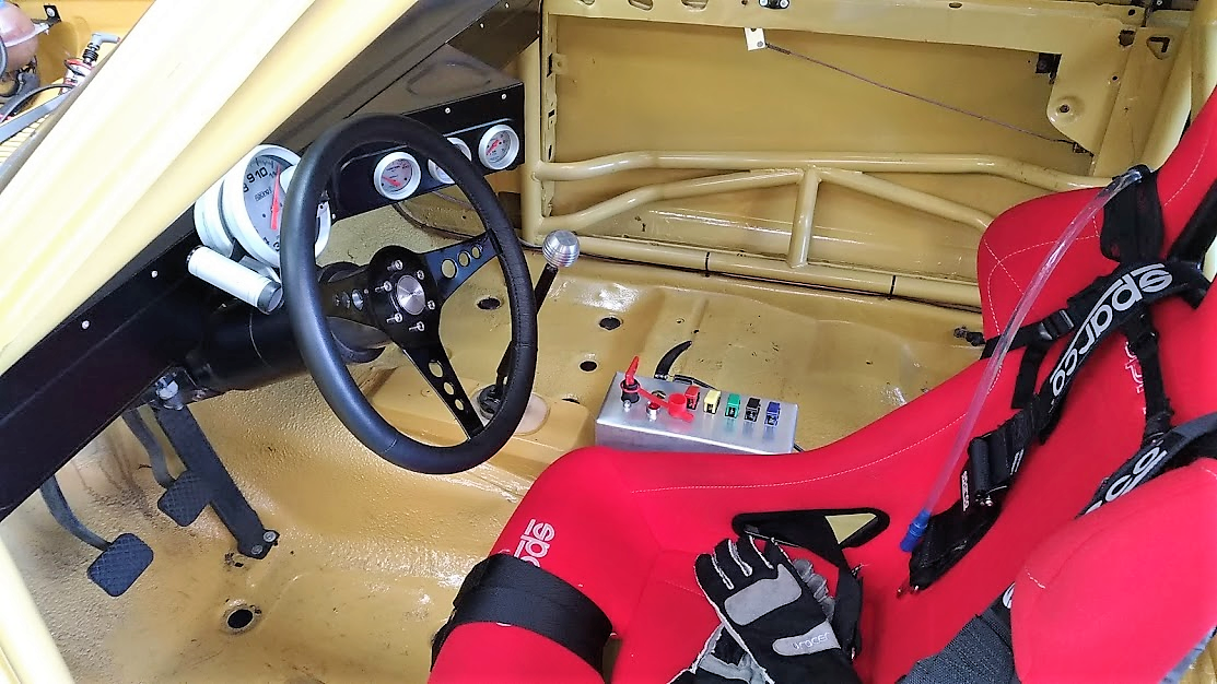 Opala 54 detalhe banco e volante.png